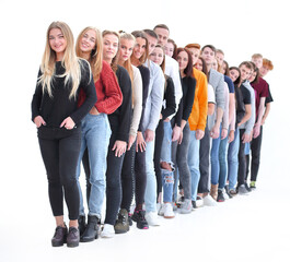 Obraz premium group of diverse young people standing in line.