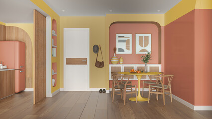 Fototapeta premium Contemporary dining room and kitchen in orange and wooden tones, round table with chairs, rattan commode, entrance door with cloth hanger. Parquet and decors. Modern interior design