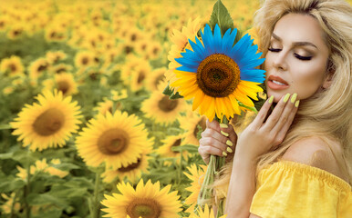 Ukrainian girl is holding blue and yellow sunflower symbolizing flag of Ukraine on the sunflower field background. Ukrainian flag is a symbol of freedom, liberty, democracy, independence.