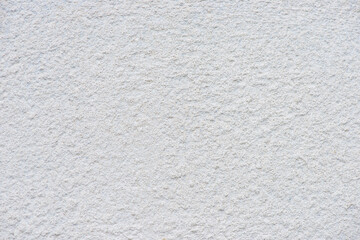 White background, plaster texture on the wall