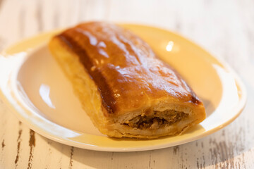 Sausage rolls or saucijzenbroodje a traditional Dutch savoury puff pastry with meat as a snack