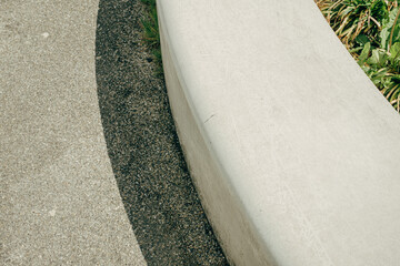 view from above on curved concrete bench