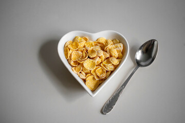 Breakfast with milk and cornflakes. 