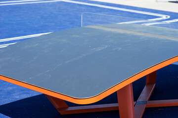 Blue curved table for the modern sport of teqball or teqpong. Mixture of table tennis and football