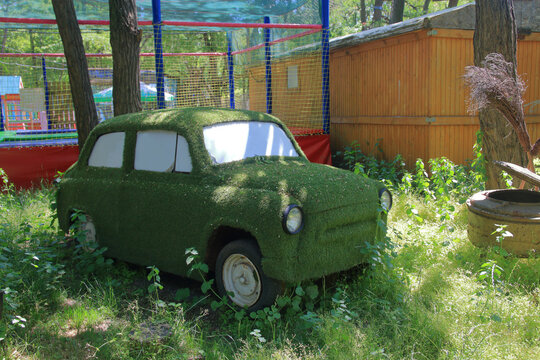 An old abandoned car with a funny tuning.