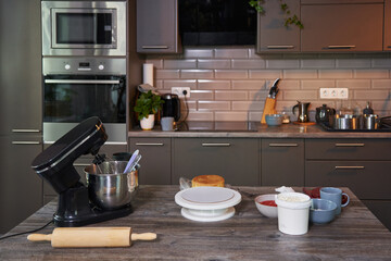 empty gray kitchen with prepared food for baking