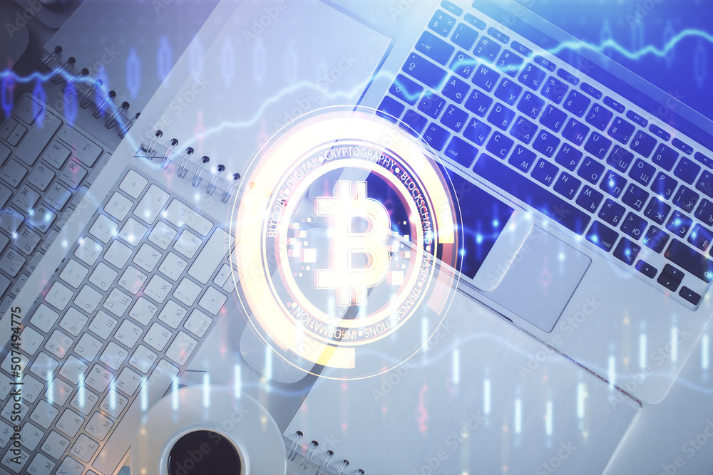Poster Blockchain theme hologram drawings over computer on the desktop background. Top view. Double exposure.