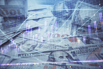Multi exposure of forex chart drawing over us dollars bill background. Concept of financial success markets.