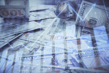 Fototapeta premium Multi exposure of forex chart drawing over us dollars bill background. Concept of financial success markets.