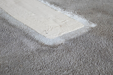 Driveway or road repair patch up with waterproofing sealant. Polymethyl methacrylate product...