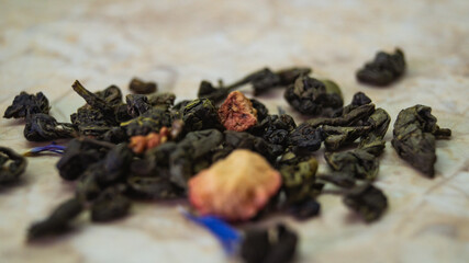 crumbly tea leaves with piece of apple