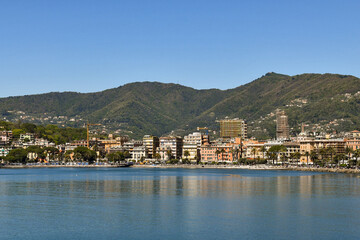 Fototapeta premium View from the sea of the city centre of Rapallo, a popular tourist destination in the Riviera of Levante, Genoa, Liguria, Italy