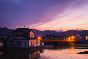 Fototapeta premium The orange purple sunset in the Japanese village is very beautiful and peaceful
