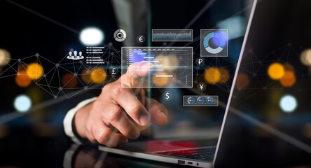 On his left hand, a man in a suit holds a cell phone. On a rapidly expanding stock chart, his right hand point. Background of a globe with hazy lights