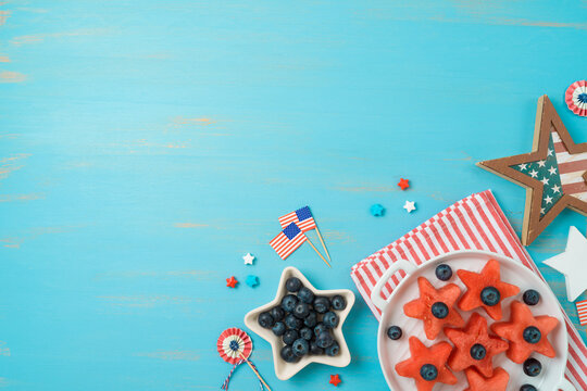 4th Of July Festive Picnic With Watermelon Fruit Salad On Wooden Table. Happy Independence Day Concept. Top View, Flat Lay