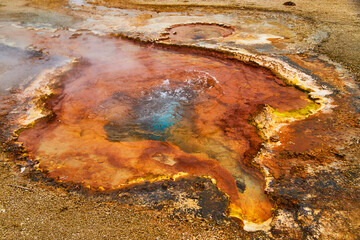 Detail of small Yellowstone pool with rings of color
