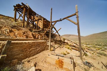 Hillside with abandoned mining equipment at Eureka Mine in Death Valley