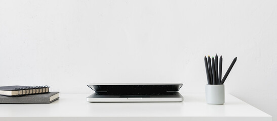 Table with laptop mock up. Minimal workplace. Desk of designer.	 Banner.