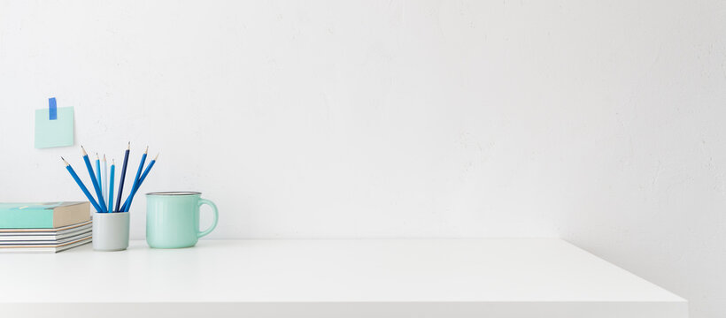 Stylish and minimal home office learning workplace. Workspace at home. Empty desk.	