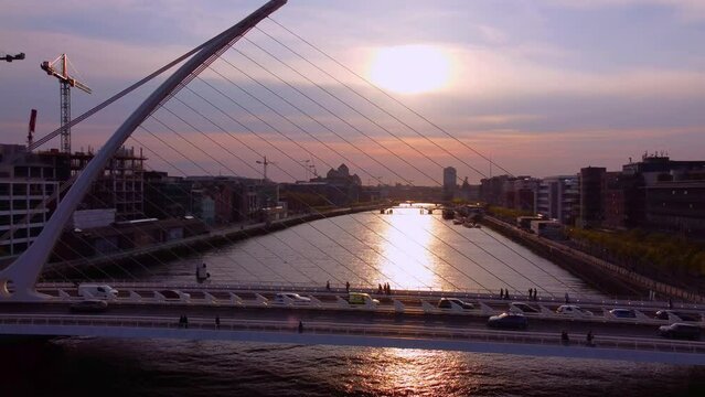 Samuel Beckett Bridge over River Liffey in Dublin - aerial view by drone