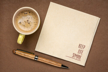 keep life simple  inspirational writing - reminder note on a napkin with coffee, simplicity,...