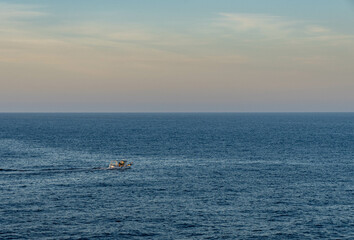 lonely boat on the mediterranea sea