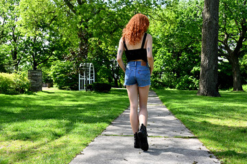 Beautiful young woman in a park