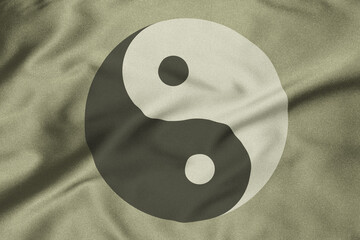 .The image of the sign of yin and yang on the fabric - obrazy, fototapety, plakaty