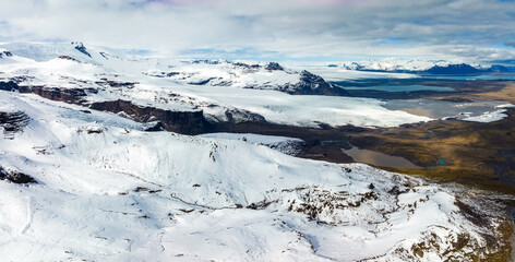Aerial view of the glaciers and snowy mountains near Jokulsalon lagoon in Iceland.