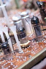 A fragment of the electronic board of an old TV on electron tubes. A rare electronic board with electron tubes