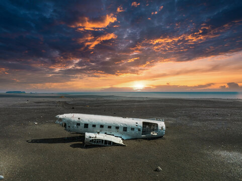 Aerial view of the old crashed plane abandoned on Solheimasandur beach near Vik in Iceland. Landscape with popular tourist attraction in Iceland. Exciting excursion to the sights view in winter