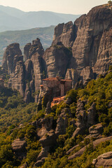 Fototapeta na wymiar Rocks with christian orthodox monasteries in Meteora valley near Kalambaka, Thessaly, Greece