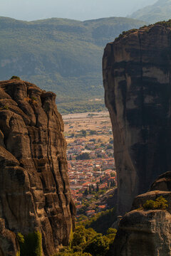 Travel in Greece. Famous Kalampaka town with Metora cliffs in sunny day