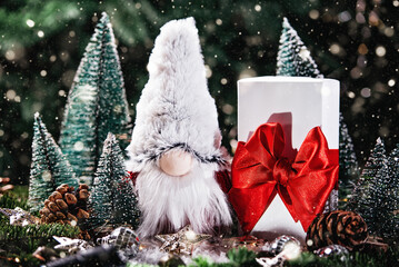 Merry christmas. Christmas composition with gnome and festive decorations on wooden background....