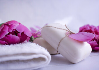 Solid soap, peony flower on a light background