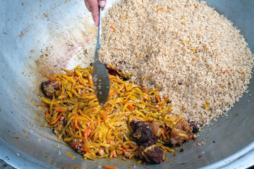 Pilaf  from rise , meat and onion ( baked)  - national uzbek dish from  uzbek cuisine in Samarkand or Khiva or Tashkent - obrazy, fototapety, plakaty