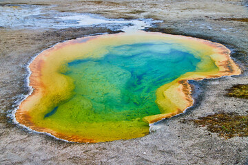 Full colorful thermal pool in Yellowstone Biscuit Basin - obrazy, fototapety, plakaty