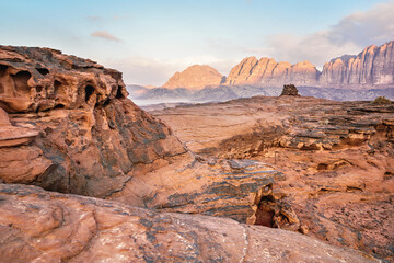 Red sandstone rocks formations in Wadi Rum also known as Valley of the Moon desert, Jordan, scene reminiscent to Mars planet