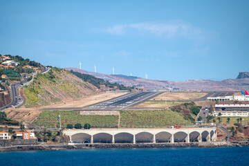 Funchal airport runway at sunny noon, Madeira