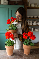 Caucasian woman in eyeglasses with red flowers 