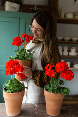 Caucasian woman in eyeglasses with red flowers 
