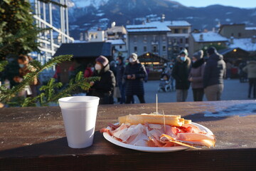 Hot wine and delicious plate during the winter