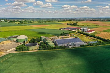 Drone image of a modern biogas plant in Germany during daytime - obrazy, fototapety, plakaty