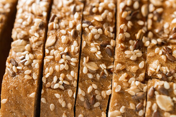 Traditional sourdough bread sliced smeared with butter baked