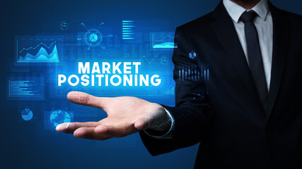 Hand of Businessman holding motivational message