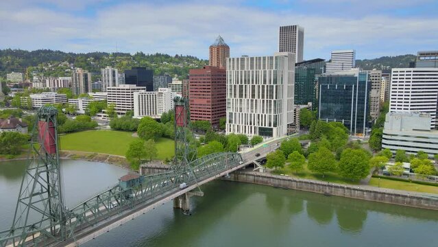 Aerial Portland Oregon Drone Video pulling back from the Portland Skyline revealing the downtown business district.