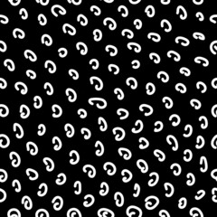 Texture seamless pattern of white hooks on a black square background