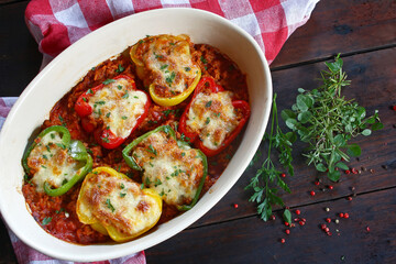 Stuffed paprika with meat, rice, vegetables and cheese