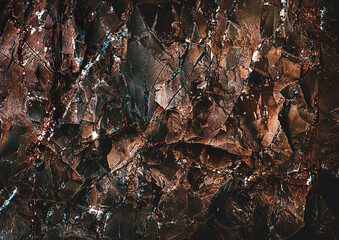 Wall marble. Brown texture. Stone background. Rock texture. Grunge Rough structure. Abstract texture. Rock surface with cracks. Rock pile. Paint spots wall.