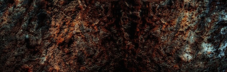 Brick brown Wall. Rock pile. Rock background. Rock texture. Stone background. Paint spots. Rock surface with cracks. Grunge Rough structure. Abstract texture.